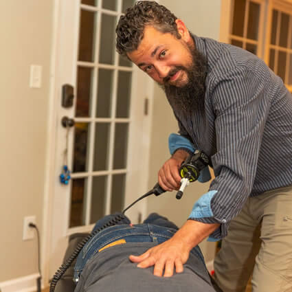 dr-chris-adjusting-patient